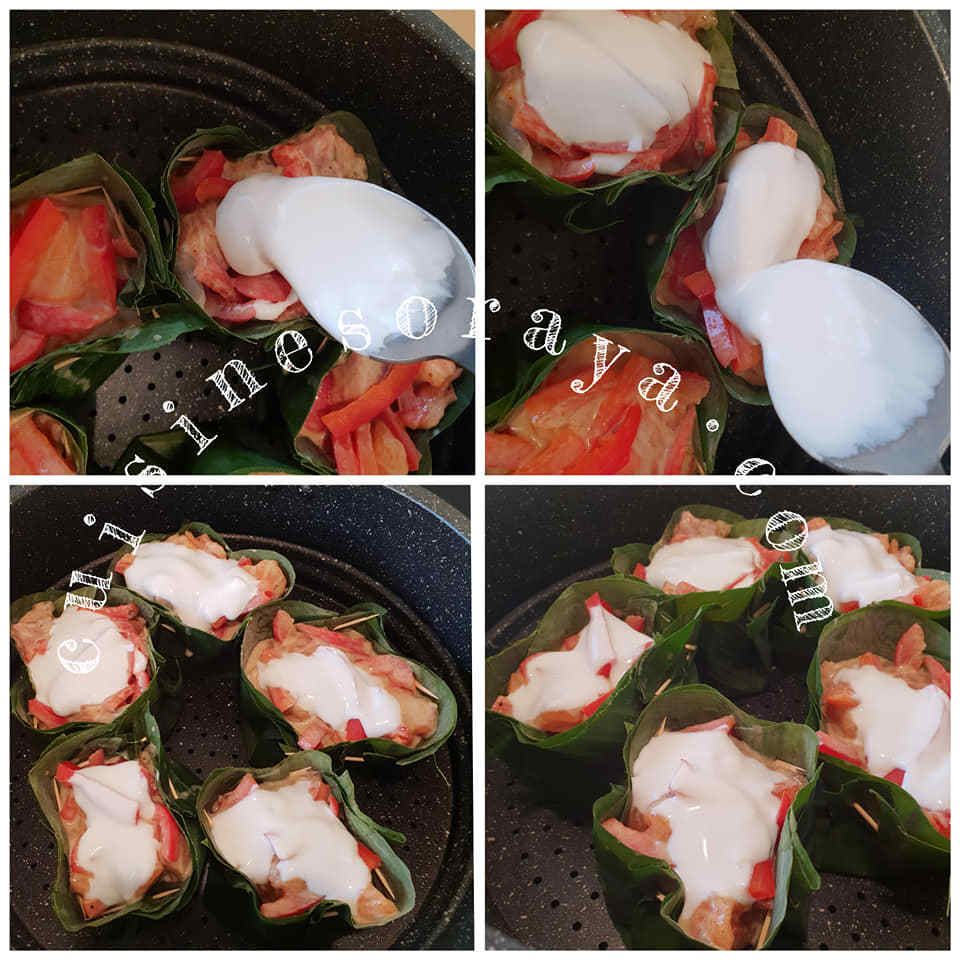 Saumon à la vapeur dans des feuilles de bananier