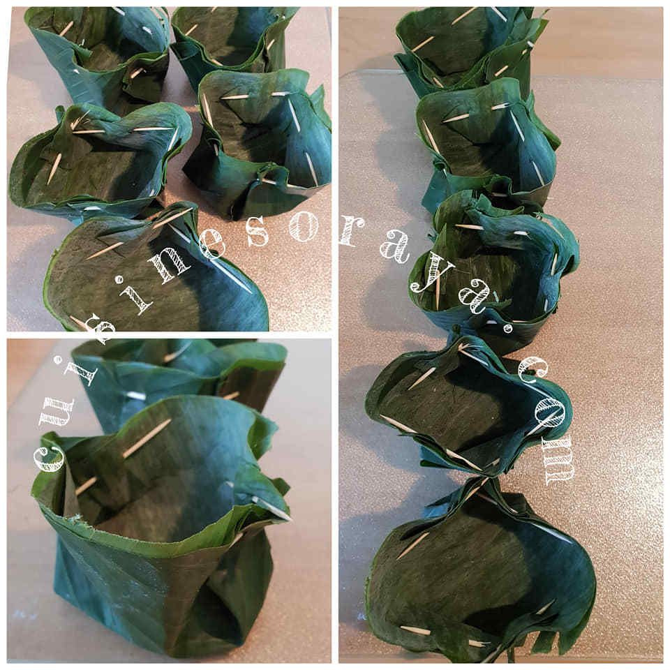 Saumon à la vapeur dans des feuilles de bananier